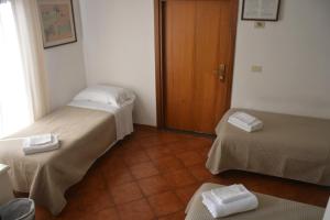 Posteľ alebo postele v izbe v ubytovaní Hotel Cordova