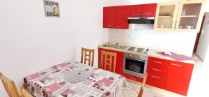 Kuchyň nebo kuchyňský kout v ubytování Apartments Posta