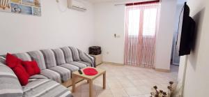 TV a/nebo společenská místnost v ubytování Apartments Posta