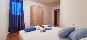 Postel nebo postele na pokoji v ubytování Apartments Posta