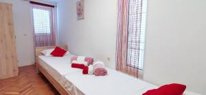 Postel nebo postele na pokoji v ubytování Apartments Posta