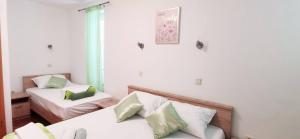 Posteľ alebo postele v izbe v ubytovaní Apartments Posta