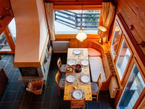an overhead view of a table and chairs in a boat at Chalet Crettamour by Interhome in Veysonnaz