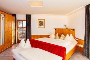 Postel nebo postele na pokoji v ubytování Ferienhaus Zentral + 17 fotografií