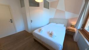 7Rooms客房内的一张或多张床位