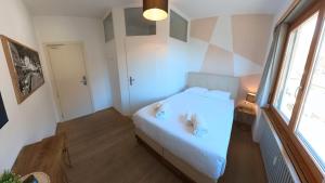 7Rooms客房内的一张或多张床位
