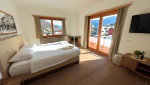 Postel nebo postele na pokoji v ubytování 7Rooms