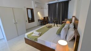 a bedroom with a large bed in a room at Shavona Bliss Mirissa in Mirissa +21 photos