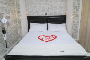 Postel nebo postele na pokoji v ubytování Fuego Hotel