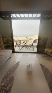 Ένα ή περισσότερα κρεβάτια σε δωμάτιο στο Beach Front Views
