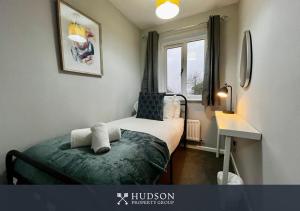 Ένα ή περισσότερα κρεβάτια σε δωμάτιο στο 3 Bedroom Home in Telford