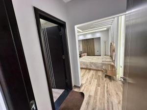 Postel nebo postele na pokoji v ubytování Grand Oasis Rooms