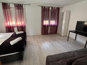 TV a/nebo společenská místnost v ubytování 3 Zimmer Wohnung