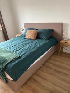 Кровать или кровати в номере ApartChazal