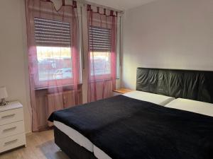 Postel nebo postele na pokoji v ubytování 3 Zimmer Wohnung