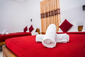 Rúm í herbergi á Theevanni Resort