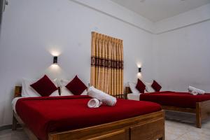 Rúm í herbergi á Theevanni Resort
