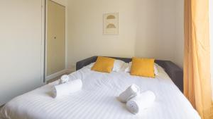 Ένα ή περισσότερα κρεβάτια σε δωμάτιο στο Sunshine - Appartement neuf - parking