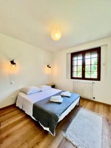 Postel nebo postele na pokoji v ubytování Maison lumineuse Route de Boisseuil- DABNB