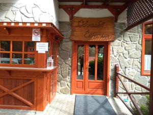 Fațada sau intrarea în Odvaskő Turistaház