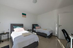 Posteľ alebo postele v izbe v ubytovaní Villa Brionika mit Pool