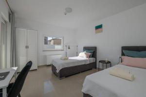 Posteľ alebo postele v izbe v ubytovaní Villa Brionika mit Pool