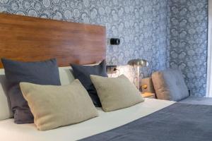 Łóżko lub łóżka w pokoju w obiekcie Luxury Apartment Alcazaba by Nagoa Homes