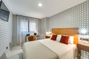 Łóżko lub łóżka w pokoju w obiekcie Luxury Apartment Alcazaba by Nagoa Homes