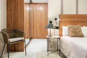 Łóżko lub łóżka w pokoju w obiekcie Luxury Apartment Alcazaba by Nagoa Homes