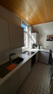 Dapur atau dapur kecil di 1 Zimmer Apartment