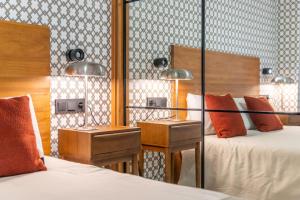 Łóżko lub łóżka w pokoju w obiekcie Luxury Apartment Alcazaba by Nagoa Homes