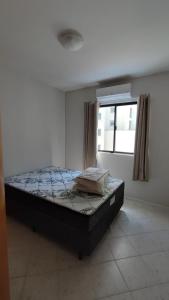 Postel nebo postele na pokoji v ubytování Apartamento no Coração de Bc, pertinho da Praia