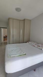 Postel nebo postele na pokoji v ubytování Apartamento no Coração de Bc, pertinho da Praia + 6 fotografií