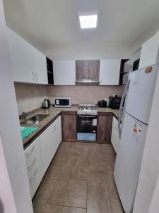 Kuchyň nebo kuchyňský kout v ubytování Departamento centrico Mascardi