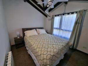 Postel nebo postele na pokoji v ubytování Departamento centrico Mascardi