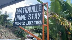 Matraville Home Stay Tuk Tuk Lake Toba Samosir的证书、奖牌、标识或其他文件
