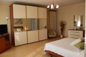 Lova arba lovos apgyvendinimo įstaigoje Cascina Fietta - Wine Dreams Apartments