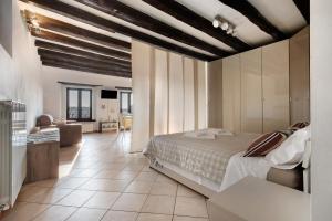 Ένα ή περισσότερα κρεβάτια σε δωμάτιο στο Casa vacanza Civetta