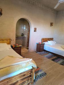 A bed or beds in a room at انير انشال Enir Enshal