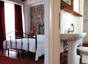 Voodi või voodid majutusasutuse Albergo Julienne toas