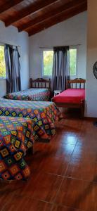 Ένα ή περισσότερα κρεβάτια σε δωμάτιο στο El Molle