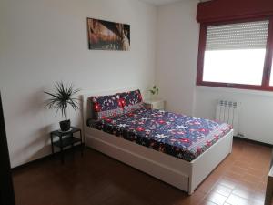 Postel nebo postele na pokoji v ubytování Ciao Brescia