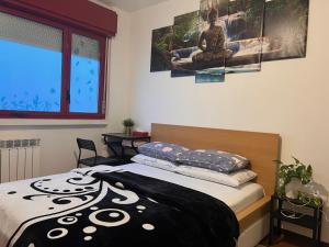 Postel nebo postele na pokoji v ubytování Ciao Brescia