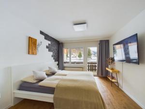 Voodi või voodid majutusasutuse Enjoy the View Apartment Close to Zermatt with Parking toas