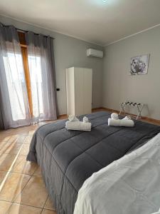 Giường trong phòng chung tại Guest House La Casaccia