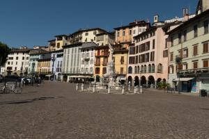a city street with buildings in the background at Casa Dagu in Lovere