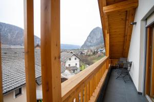 a balcony with a view of the mountains at Apartma pri Hrvatu in Bohinj