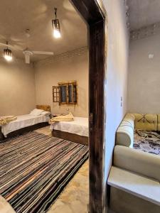 A bed or beds in a room at انير انشال Enir Enshal