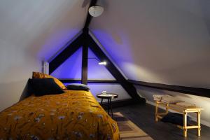 Postel nebo postele na pokoji v ubytování B&B Het Havenhuis