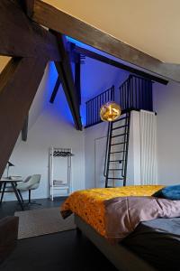 Postel nebo postele na pokoji v ubytování B&B Het Havenhuis